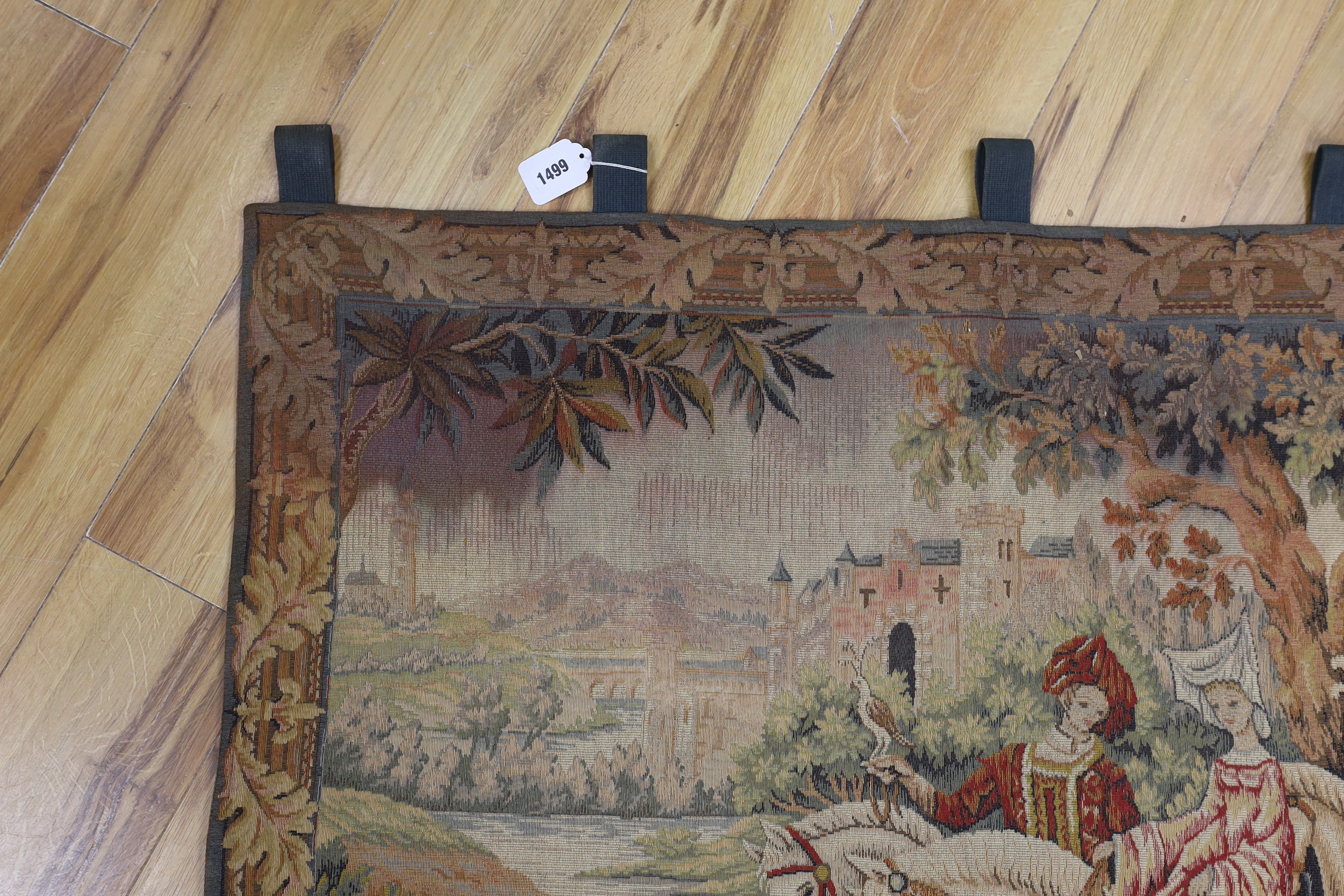 A machine tapestry panel of a Medieval figurative scene, 115cm wide, 91cm (not including hanging loops)